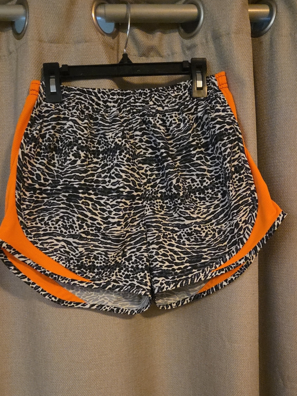 Nike Women's Black & White Animal Print Running Shorts with Orange Side Panels